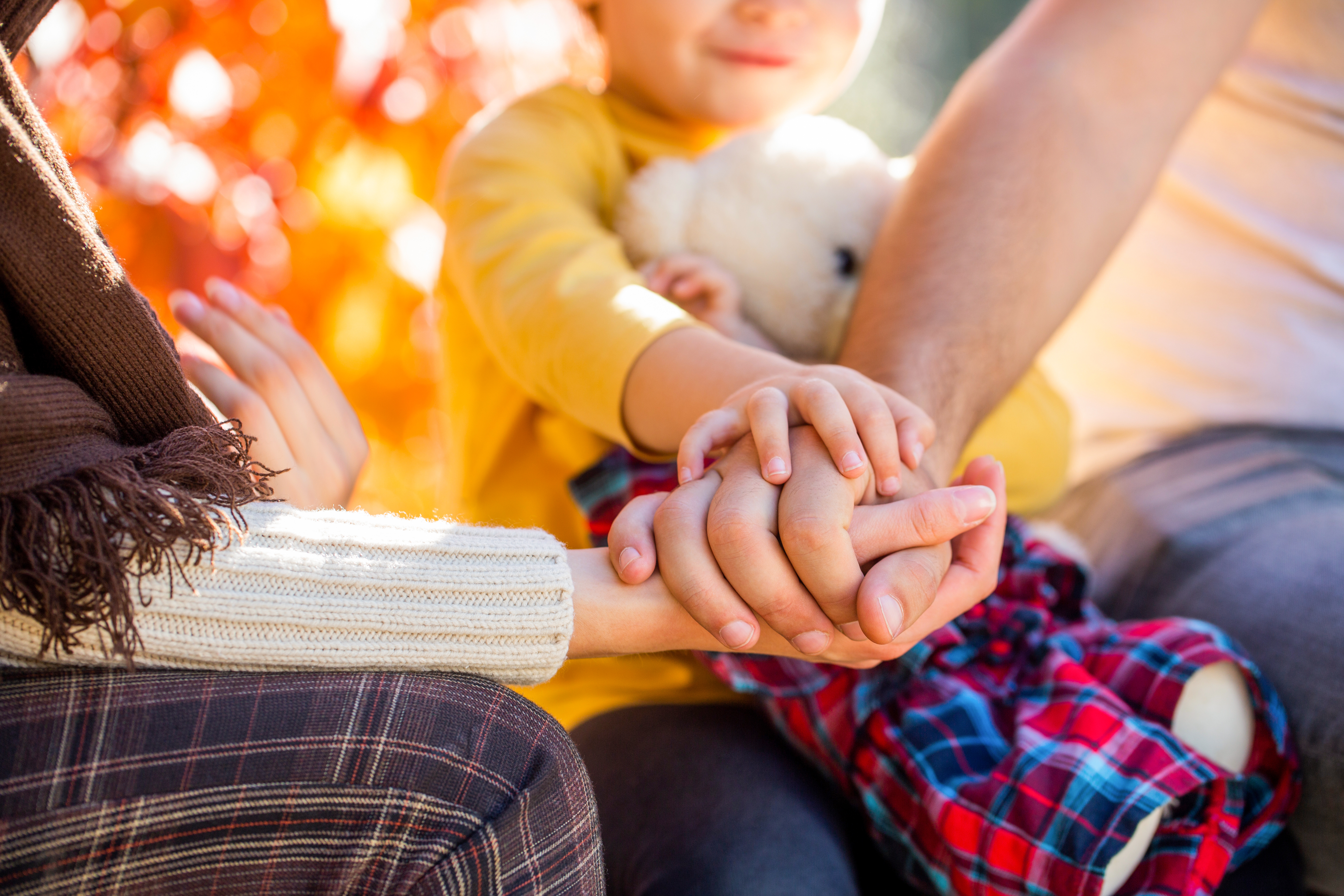 Family holding hands