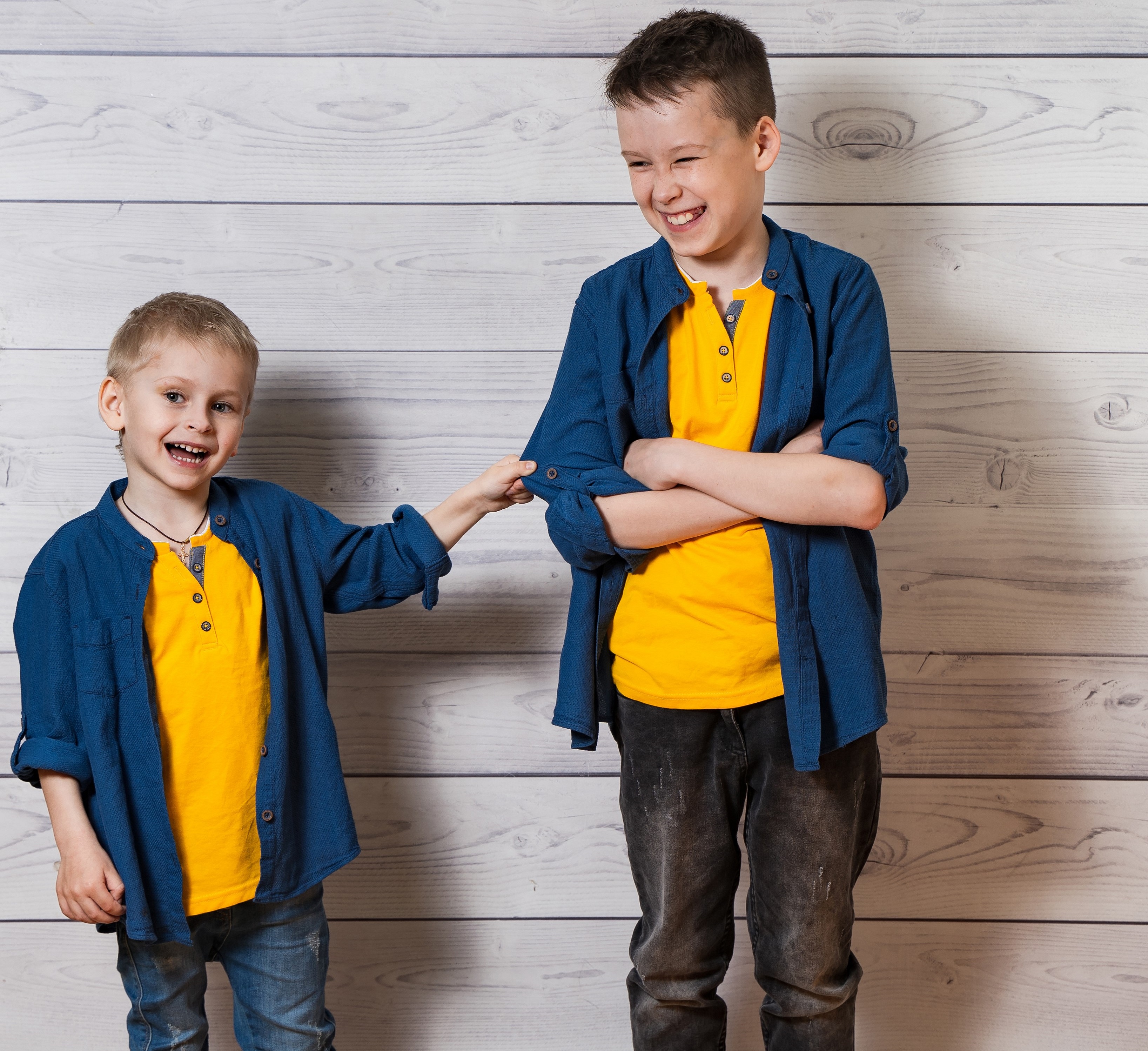 Two brothers smiling together