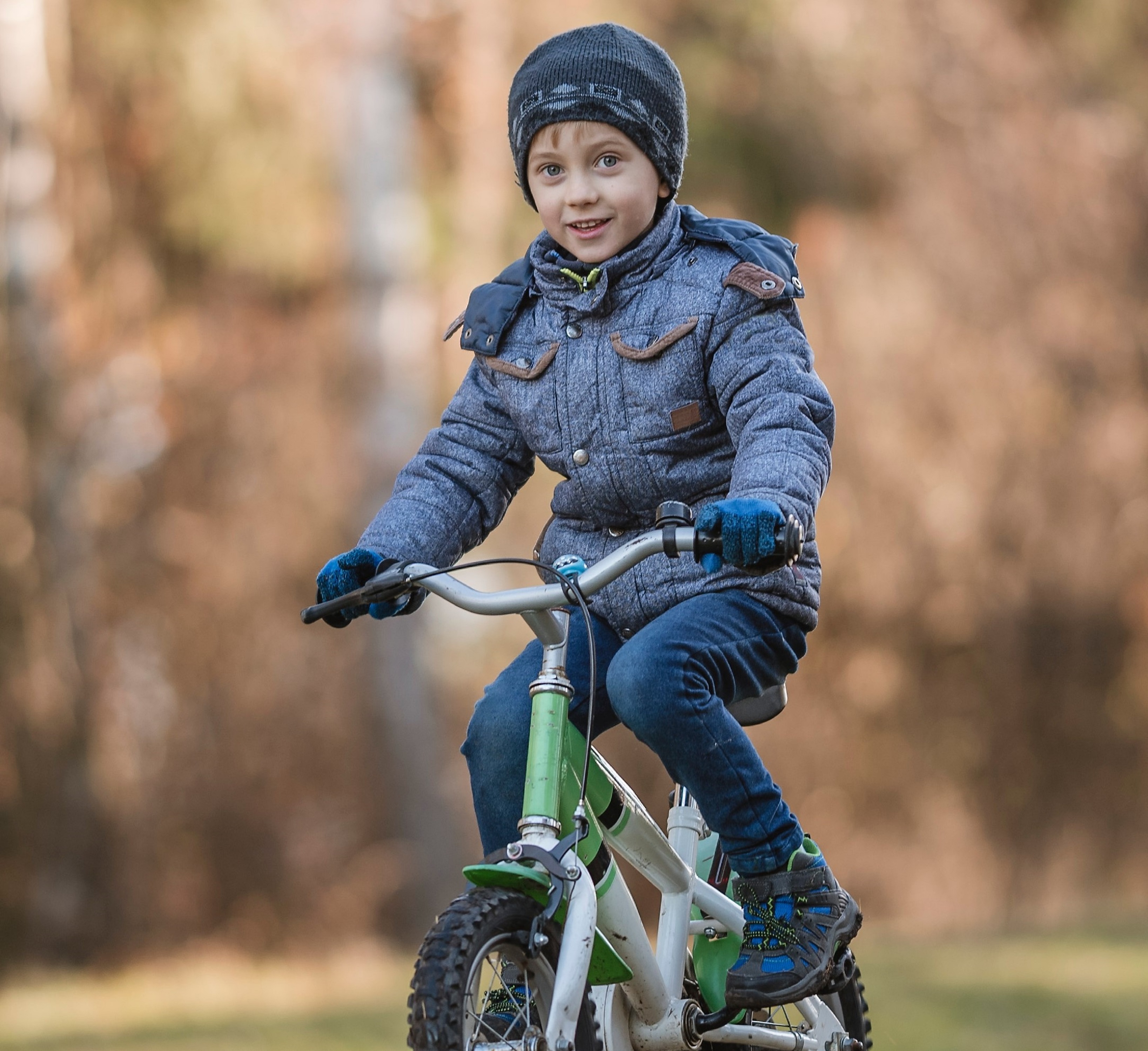 Little boy riding bike