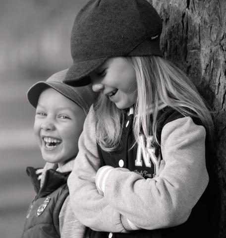 Borther & sister smiling