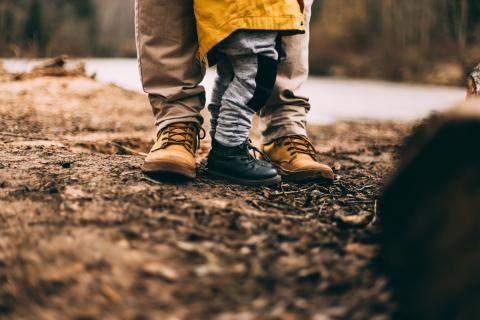 image to highlight Adoption Now single adoption blog - adult feet and child feet 