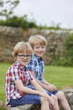two children sitting down