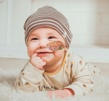 Infant with feeding tube