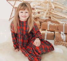 Blonde girl smiling at camera